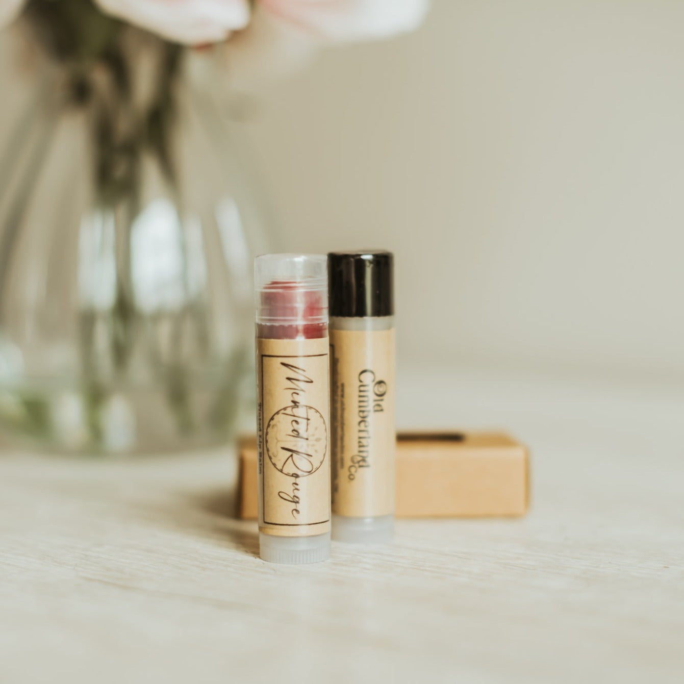 Handcrafted natural lip balm tubes in classic and seasonal flavors