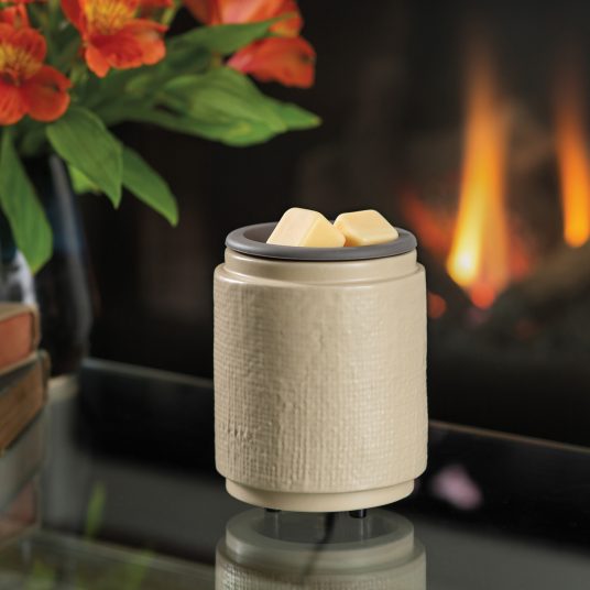 Easy-clean wax warmer with cream finish and embossed texture